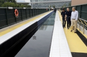 From left: Trainer Michael Chang, Club��s Chief Executive Officer Winfried Engelbrecht-Bresges, and Head of Racing Operations and Services K L Cheng, inspect the equine swimming pool after the ceremony. 