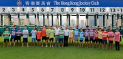 Andrew Harding (tenth from left), Executive Director, Racing Authority; Anthony Kelly (twelfth from left), Executive Director, Racing Business and Operations; as well as all participants of the annual Jockeys�� Sprint pose for a group photo before the contest.