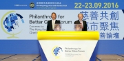 Club Chairman Dr Simon S O Ip (left) joins Hong Kong SAR Financial Secretary The Hon John C Tsang (right) at the opening ceremony of the Philanthropy for Better Cities Forum.