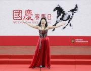 Photos 2, 3<br>
Mezzo-soprano Shasha Niu, of the China National Opera House performs at the opening ceremony, and leads the singing of the National Anthem, accompanied by the Hong Kong Police Band.
