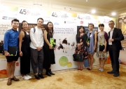 The Club's Head of Charities (Grant Making aᡧ Sports, Recreation, Arts and Culture) Rhoda Chan (4th right) and local young dancers of The Hong Kong Jockey Club Contemporary Dance Series.