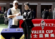 Before the race, Lily Chow, Executive Director of Chevalier International Holdings Limited, presents a prize of HK$1,500, a commemorative crystal stand and a cash coupon of HK$2,000 from the Chevalier Group, to the Stables Assistant responsible for Super Lifeline, the Best Turned Out Horse in the Chevalier Cup.