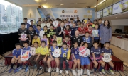Club Chief Executive Officer Winfried Engelbrecht-Bresges (third row, 7th right), Head Coach of MUSS in Hong Kong Christopher Oa?Brien (third row, 5th right), Manchester United Academy Player Development Manager Les Parry (second row, 2nd right), Rex Tso (second row, 1st right) and participating school representatives take a group photo.
