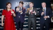 Ms. Karen Au Yeung, Vice President of LONGINES Hong Kong (left) and Mr. Anthony Kelly, Executive Director, Racing Business and Operations of HKJC (right) join Mr. Juan-Carlos Capelli and Mr. Winfried Engelbrecht-Bresges for a toast at the signing ceremony.