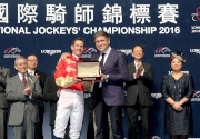 Photo 6<br>
Mr Juan-Carlos Capelli (right), Vice President of LONGINES and Head of International Marketing, presents a LONGINES Conquest Classic Collection watch to Hugh Bowman, winner of the LONGINES International Jockeys' Championship.
