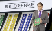 Juan-Carlos Capelli, Vice-President of LONGINES and Head of International Marketing, begins the barrier draw for the LONGINES Hong Kong Vase by picking the first horse name.