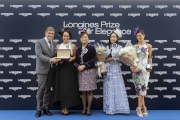 Mr. Juan-Carlos Capelli, Vice President of LONGINES and Head of International Marketing presents a LONGINES watch to the 