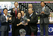 Photos 4, 5, 6: Stephen Ip, Steward of the HKJC, presents the silver dishes to Harbour Master��s Owners Mr and Mrs Chow Kay Yui; Trainer John Moore and Jockey Zac Purton.