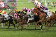 Beauty Generation holds off a group of challengers to put himself into Classic Mile contention.
