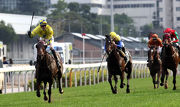 Werther (left) wins the G1 AP QEII Cup last April on rain-affected ground.