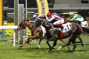 Game Of Fun (inside), ridden by Zac Purton, just holds off Contribution (red cap), ridden by Douglas Whyte, to land trainer John Size��s 1000th winner in Hong Kong.