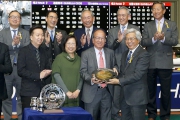 5, 6, 7<br>Dr. Eric Li Ka Cheung, Steward of the HKJC, presents the Happy Valley Trophy and a silver dish to Blocker Dee��s owners Mr. & Mrs. Kenneth Au-Yeung Wing, and souvenirs to trainer Caspar Fownes and jockey Karis Teetan.