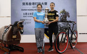 Photos 6, 7: Joao Moreira and Sarah Lee pose for photos with the BMW Hong Kong Derby trophy.