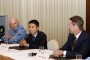 Photo 4, 5: Matthew Poon takes media questions during the session with the local media contingent.