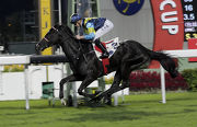 Jolly Banner completes a hat-trick of wins over 1400m earlier this season.