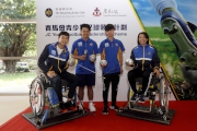 Rex Tso (1st left) and Chan Yuen-ting (1st right) participate in a wheelchair friendly game. 

