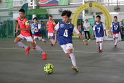 Photo 10 to 13:<br>
Zone 7 aᡧ Pursuit of a Football Dream: Outstanding young players take part in the HKJC Soccer 4 tournament for an opportunity to visit Manchester United's training base. ''Family Football Fun'' is another new feature this year, where parents coach their children to demonstrate teamwork (Photo 10, 11). Manchester United football legend Peter Schmeichel, also makes an appearance (Photo 12). He plays with kids and teaches football skills. The freestyle footballer Lyson Sze  interacts with the audience (Photo 13) aᡧ the atmosphere is electrifying!