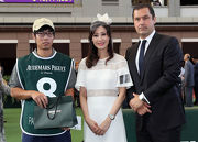 Mr Yves Meylan, Chief Commercial Officer of Audemars Piguet (right) and Ms Michele Reis, Ambassador of the Audemars Piguet QEII Cup 2017 (centre), jointly present a cash prize and a souvenir to the Stables Assistant responsible for Pakistan Star, the Best Turned Out Horse before the Audemars Piguet QEII Cup.