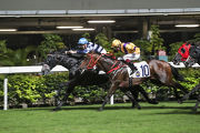 Chad Schofield punches out Ricky Yiu-trained Packing Dragon (inside) to win the Class 2 Cornwall Handicap (1800m).
