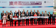 Mr. Anthony Chow, Deputy Chairman of The Hong Kong Jockey Club (front row, fifth from right), Ms Angela Leong, Vice Chairman & Executive Director of Macau Jockey Club (front row, sixth from right), Stewards and senior officials of the HKJC and MJC, guests and the connections of Macau Hong Kong Trophy winner Romantic Touch, smile for the cameras at the Macau Hong Kong Trophy presentation ceremony.