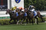 Blazing Speed (orange) wins a three-way battle with Victory Magic (No.6) and Werther (yellow) to take the Standard Chartered Champions & Chater Cup for a second time last year.