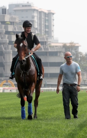 Kevin Bradshaw atop Convey with Mark Westgate (right) at Sha Tin this morning.