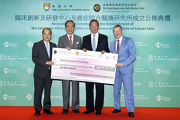 The donation of over HK$1.244 billion is the Cluba?s largest single donation to medical development in this financial year and the greatest single donation ever received by HKU and its Medical Faculty. Club Chairman Dr Simon S O Ip (2nd right) and Chief Executive Officer Winfried Engelbrecht-Bresges (1st right) presents a cheque to HKU Council Chairman Professor Arthur Li (2nd left), witnessed by Chief Secretary for Administration Matthew Cheung (1st left).