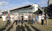 1, 2<br>Club officials and trainers join the champagne toast at Sha Tin Racecourse.