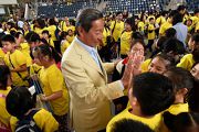 Dr Ip congratulates schoolchildren after they set a new world record at the Riding High Together Festival,  the Club's annual flagship community event.  