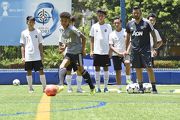 The District All-Stars team trains with Manchester Uniteda?s Academy U16 team at the Jockey Club Kitchee Centre. (15 August)
