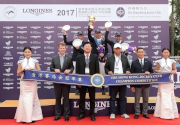 Club Steward Michael T H Lee (second from right of the front row) and Executive Director of Racing Authority Andrew Harding (second from left of the front row) in a group photo with winners of The Hong Kong Jockey Club Champion Competition. Third from left of the first row is Director of Guangdong Huangcun Sports Training Base Cai Jianxiang.