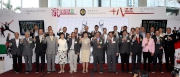 Chief Secretary for Administration Carrie Lam (1st row, seventh from left), Club Chairman T. Brian Stevenson (1st row, seventh from right), Club Stewards Anthony W K Chow (1st row, fourth from left), Philip N L Chen (1st row, fourth from right), Stephen Ip Shu-kwan (1st row, third from left), Dr Rita Fan Hsu Lai-tai (1st row, third from right), Dr Eric Li Ka-cheung (1st row, second from left), The Hon Martin C K Liao (1st row, second from right), Legislative Councillor Ip Kwok-him (1st row, sixth from right) and Leung Che-cheung (1st row, sixth from left), Director of Home Affairs Pamela Tan (1st row, fifth from left), Chairman of the Ping Wo Fund Yau Wing-kwong (1st row, fifth from right) and representatives of the 18 District Councils toast the success of the Hong Kong: Our Home Cup and 18 Districts Cup.