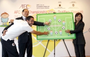 The Cluba?s Head of Charities Projects Rhoda Chan (right), HKFA Vice-Chairman Pui Kwan Kay (centre), Hong Kong U13 Representative Team Head Coach Pau Marti Vicente (left) unveil details of the competition