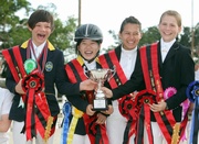 GSIS A1 team, led by the Hong Kong Jockey Club Junior Equestrian Team members Leung Oi Man (second from the left) and Lennard Chiang (first from the left), wins the championship of team competition.