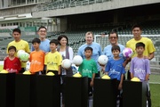 From 2nd row : Club Chief Executive Officer Winfried Engelbrecht-Bresges (3rd right), Executive Director, Charities, Douglas So (2nd left), HKFA Chairman Brian Leung (2nd right), Leisure and Cultural Services Assistant Director (Leisure Services) Olivia Chan (3rd left), the schemea?s ambassadors Chan Siu-ki (1st right) and Yapp Hung-fai (1st left) and young footballers at the ceremony.