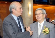 Club Steward Dr Eric Li (right) and International Social Service Hong Kong Branch Chief Executive Stephen Yau (left).