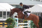 Fellow member of the HKJC Equestrian Team Patrick Lam finishes fourth in the opening leg, after collecting zero faults in the first two rounds and just four in the jump-off.