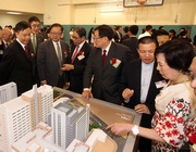 Photos 5/6: Guests take a look at a model of Yan Chai Hospital Redevelopment Project.