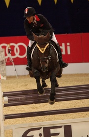 Photo 1/Photo 2:
Club-sponsored rider Samantha Lam performs well in the final leg of the 2011 FEI World Cup Jumping Chinese League to give her a second place in the overall standings. 