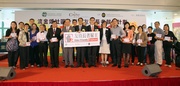 The Cluba?s Executive Director, Charities, Douglas So (front row centre), Permanent Secretary for Labour and Welfare Paul Tang (front row 7th left), SAGE Chairman Dr Kim Mak (front row 6th left), CADENZA Project Director Professor Jean Woo (front row 7th right) and representatives of participating organisations.