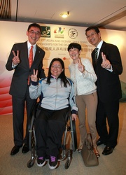Jockey Club Executive Director, Charities, Douglas So (1st left), Chairman of the Hong Kong Paralympic Committee & Sports Association for the Physically Disabled Jenny Fung (2nd right); Vice Chairman Dr James Lam (1st right) and local athlete Wong Pui Yi (2nd left). 