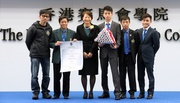 Permanent Secretary for Education Cherry Tse Ling Kit-ching (3rd from left) presents Qualifications Framework certificates to Club employees and trainees who have completed their training under the Cluba?s Certificate Racing Programme.  