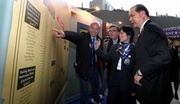 Club Chairman T Brian Stevenson (2nd from left) and Secretary for Labour and Welfare Matthew Cheung Kin-chung (1st from right) tour the Hong Kong Jockey Club College exhibition.  