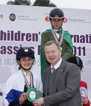 Club Chief Executive Officer Winfried Engelbrecht-Bresges (right) and one of the young international riders.