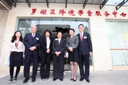 Club Steward Dr Rita Fan Hsu Lai Tai (3rd right), Executive Director, Charities, Douglas So (1st right), Deputy Head of District of Luohu District Peoplea?s Government, Zhuang Rui Ning (3rd left), Director of Shenzhen Luohu District Womena?s Federation Anna Luo (2nd right) and Chief Executive of ISS-HK Stephen Yau (2nd left) and Director of Programme Cheung Yuk Ching (1st left) pictured outside the centre.