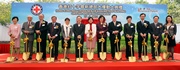 Club Chairman T Brian Stevenson (4th left) joins HKSAR Chief Executive Donald Tsang (6th left), HKRC President Selina Tsang (centre), Vice President of Red Cross Society of China Hao Linna (6th right), Secretary for Food and Health Dr York Chow (5th right), Secretary for Development Carrie Lam (4th right), Chairperson of The Shaw Foundation Hong Kong Limited Lady Shaw (5th left), Director of Social Welfare cum Chairman of the Lotteries Fund Advisory Committee Patrick Nip (3rd right), Deputy Director-General of Department of Social Affairs, Liaison Office of the Central Peoplea?s Government in the HKSAR, Li Yun Fu (2nd right), HKRC Chairman The Hon Sir TL Yang (3rd left), Deputy Chairmen Vincent Lo (2nd left) and Patricia Ling (1st left), as well as Director Lady Wu (1st right) to perform at the Hong Kong Red Cross New Headquarters Building ground-breaking ceremony.