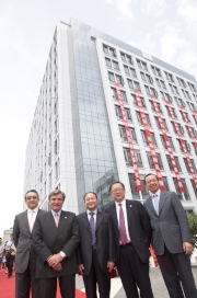 Hong Kong Jockey Club Chairman T Brian Stevenson (second from left), Club Stewards Anthony Chow (first from left) and Dr Donald Li (second from right) and Executive Director of Corporate Affairs Kim Mak (first from right) are pictured with Director of Mianyang 3rd City Hospital, Wang Hui (centre) at the Mianyang 3rd City Hospital HKJC Medical Complex.


