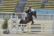 Kendall Kruger, a member of the HKJC Junior Equestrian Team, wins a silver medal in the junior team competition of the CSI* and CSIJ Seoul 2012 events.