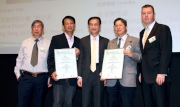 The Club's Executive Manager, Property Facilities Management, Graham Tier (first from right), Technical Services Manager, Martin Lui (first from left) and Assistant Technical Services Manager Thomas Ho (second from right) receive the Silver Award in the Non-Government Organisation/Institution Projects category of the Skyrise Greenery Awards 2012.