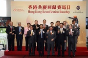 Officiating guests toast the 15th birthday of the HKSAR and the continuation of horse racing: Deputy Director of the Liaison Office of the Central Peoplea?s Government in the HKSAR Li Guikang (front row, second from left); Deputy Commissioner of the Ministry of Foreign Affairs of the Peoplea?s Republic of China in the HKSAR Hong Xiaoyong (front row, second from right); Club Chairman T Brian Stevenson (front row, middle); Club Deputy Chairman Dr Simon S O Ip (second row, first from right), Stewards Anthony W K Chow (second row, second from right), Dr Christopher Cheng Wai Chee (second row, third from right), Michael T H Lee (second row, fourth from right), Philip N L Chen (second row, fifth from left), Stephen Ip Shu Kwan (second row, fourth from left), Dr Rita Fan Hsu Lai Tai (second row, third from left), Dr Eric Li Ka Cheung (second row, second from left), Sir C K Chow (second row, first from left), Club Chief Executive Officer Winfried Engelbrecht-Bresges (front row, first from right) and Legislative Council member the Hon Ip Kwok-him (front row, first from left).